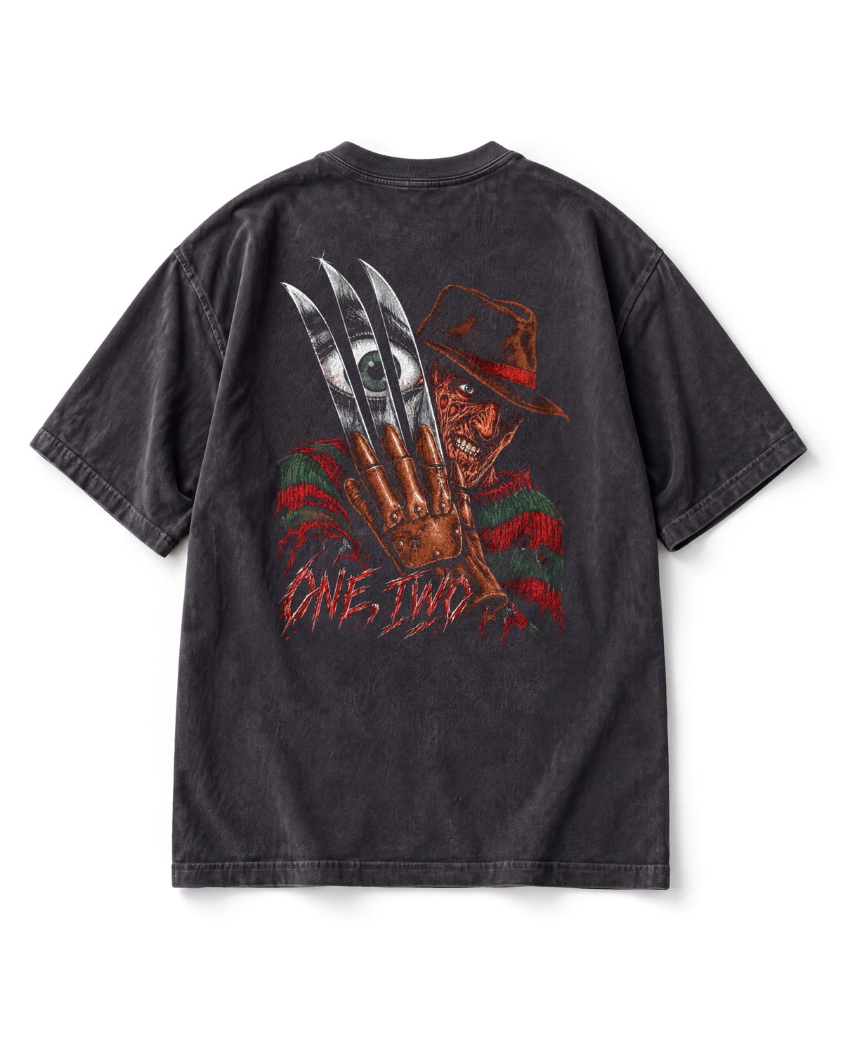 Back print: a bladed glove with an eye reflected in it, Freddy in a fedora grinning behind, ONE, TWO lettering below.