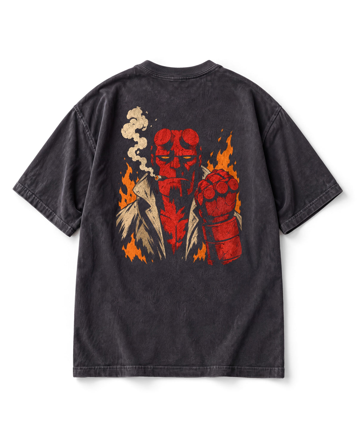 Back print: a huge frontal Hellboy in a trench coat with horn stumps and the Right Hand of Doom raised, flames behind him.