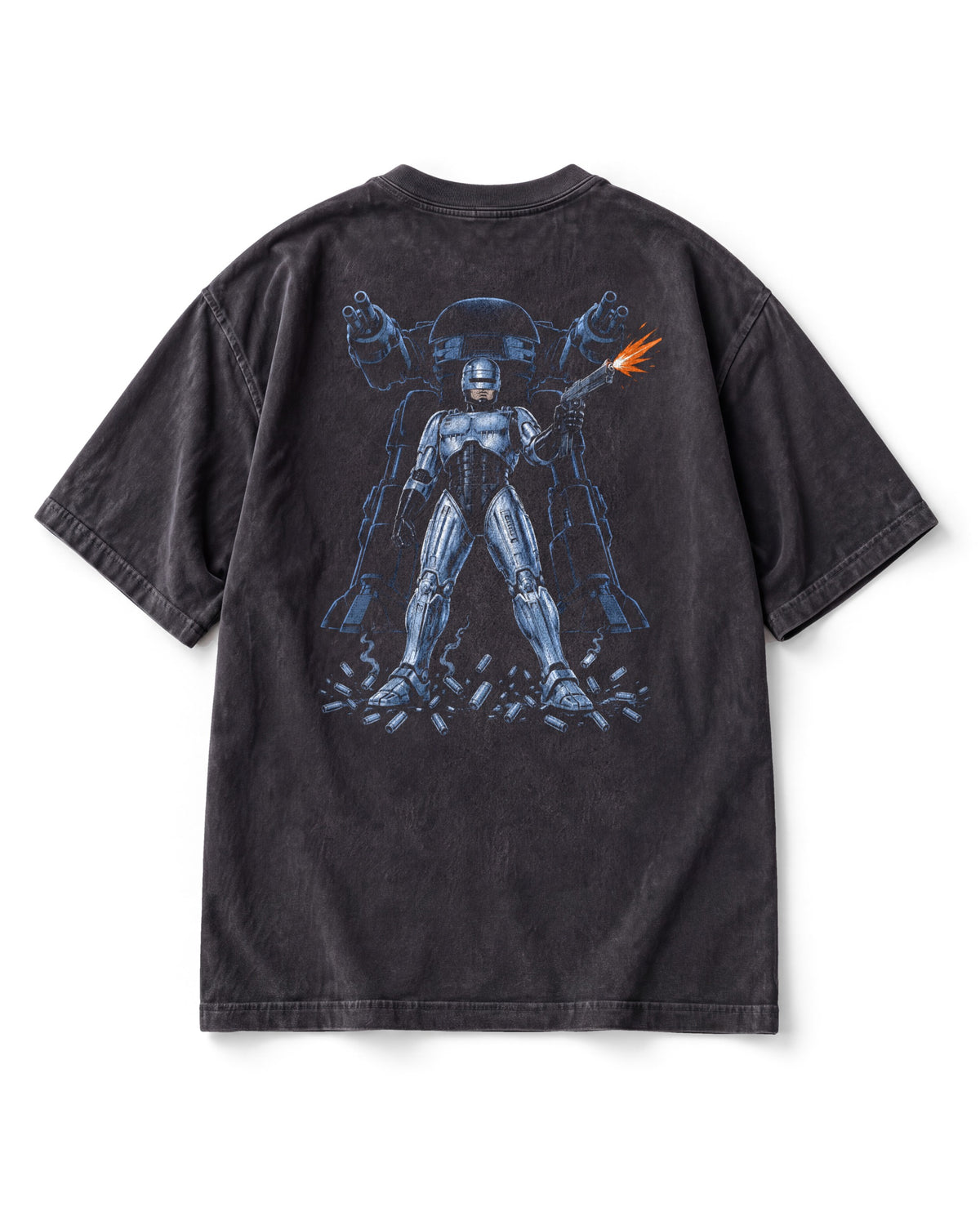 Back print: RoboCop in silver-blue armour drawing a pistol, the ED-209 robot looming behind him, shell casings below.
