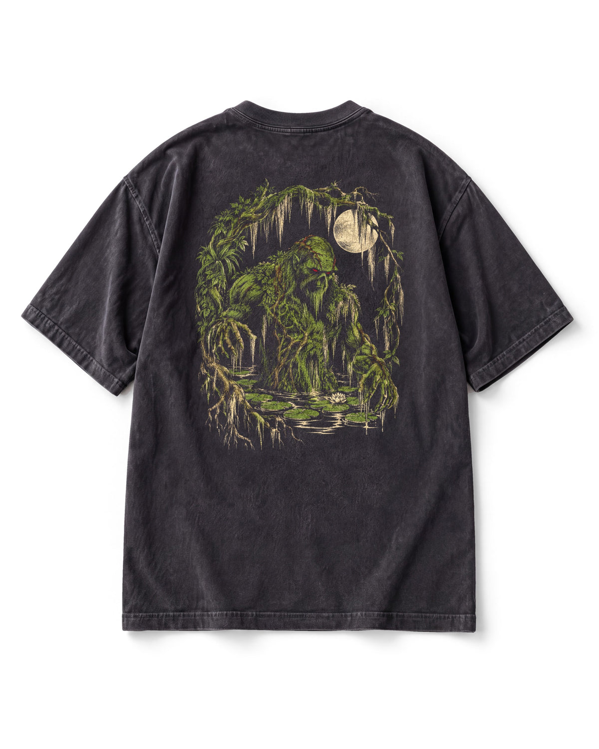 Back print: Swamp Thing, a figure of moss and roots with red eyes, rising from a bayou inside an open ring of vines.